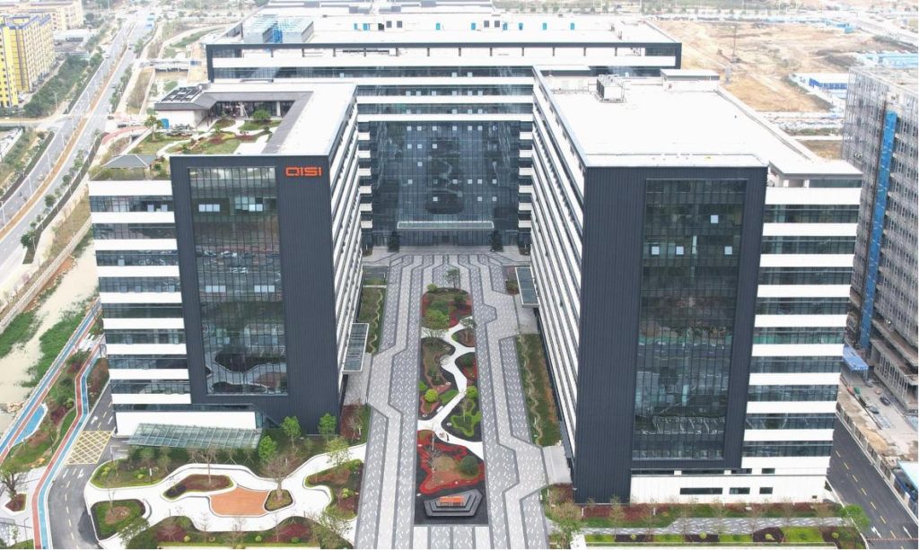 Aerial exterior photograph of Zhuhai Qisitech Intelligent Industrial Park from Geekvape's official newsroom.