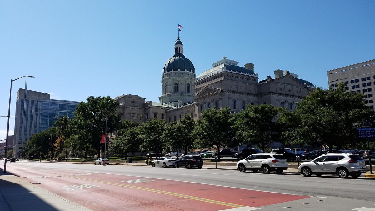 Indiana Statehouse in Indianapolis beneath a blue sky, photographed in October 2021
