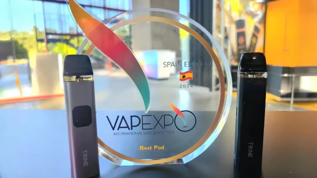 Two Innokin Trine devices beside a Vapexpo Spain 2024 trophy in an official Innokin photograph.