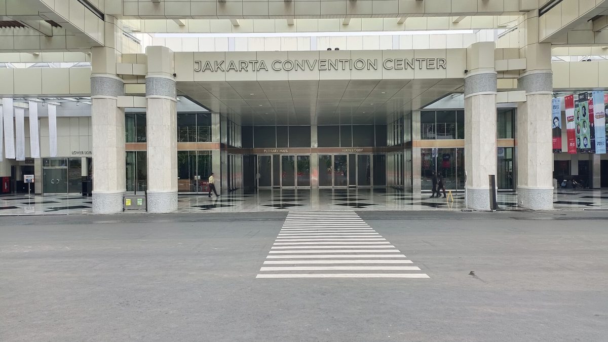 The entrance to Jakarta Convention Center with its name above the doors