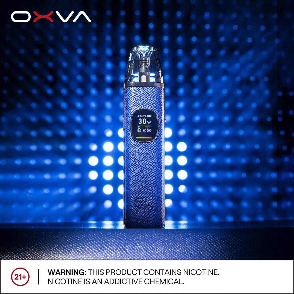 Blue OXVA XLIM PRO 2 standing against a blue photographic background